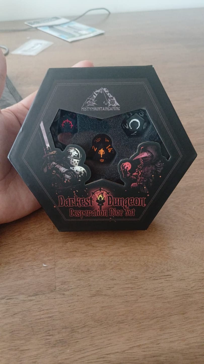 Customer photo review of Darkest Dungeon Desperation Sharp-Edged Resin Dice Set