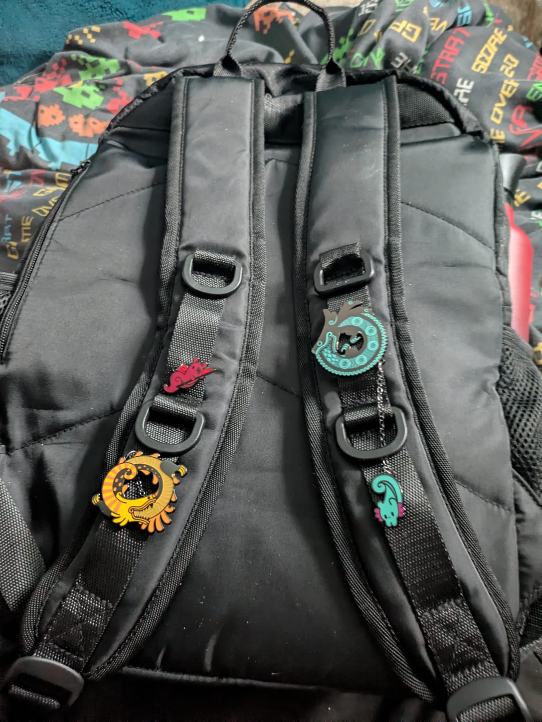 Customer photo review of Rain World - Yellow Lizard Hanger Pin