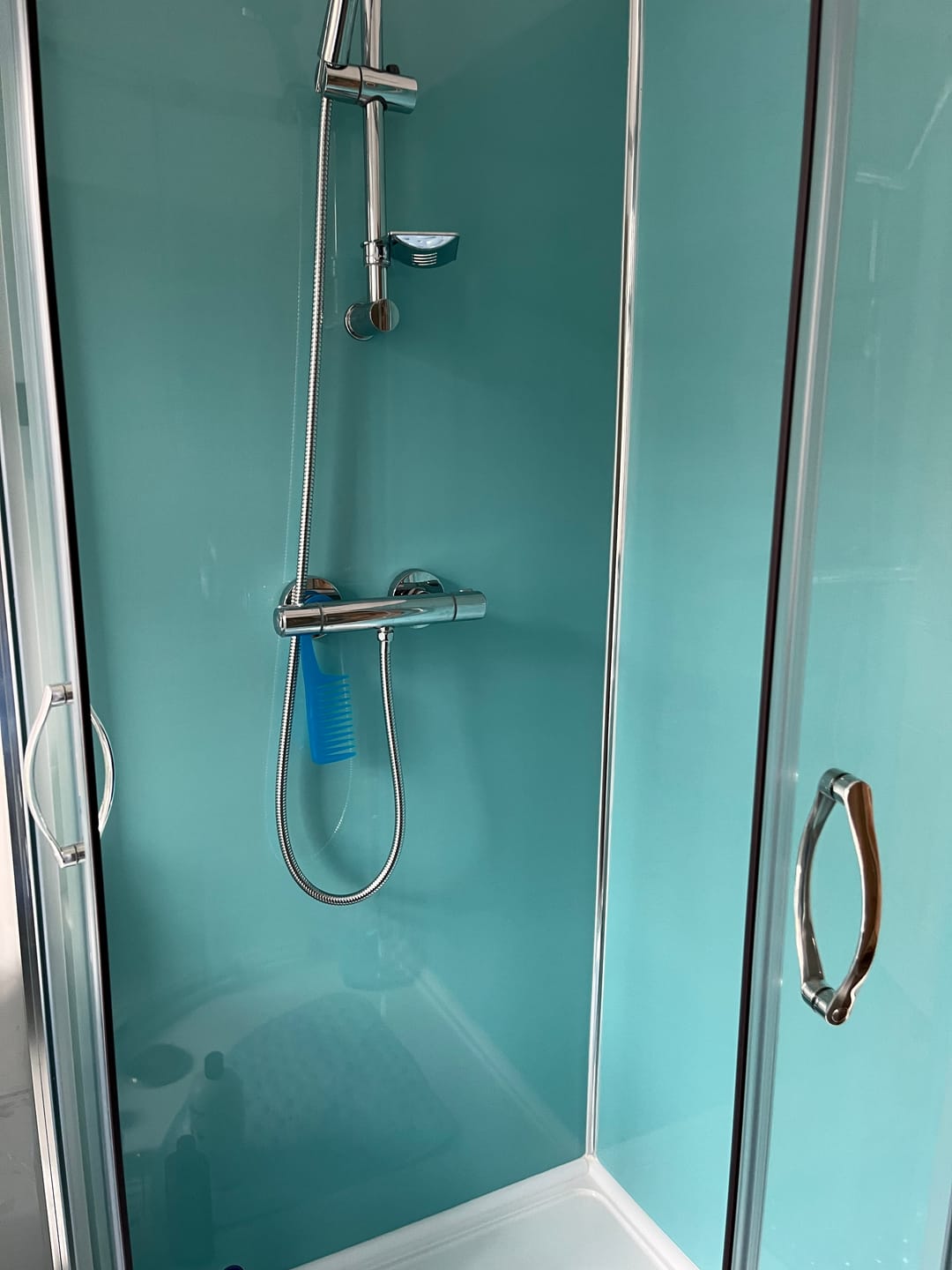 Customer photo review of 10mm Aqua Blue Shimmer Gloss Shower Panel 1M x 2.4M
