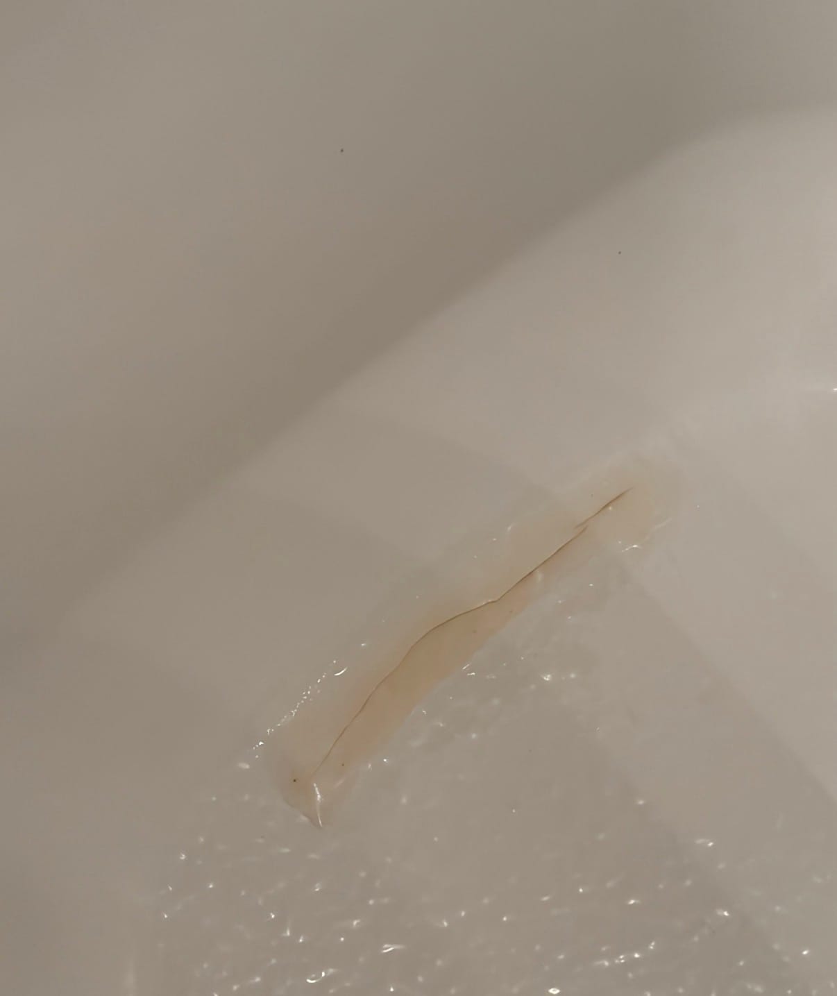 Customer photo review of Floor Crack Repair - Tub and Shower Repair Kit