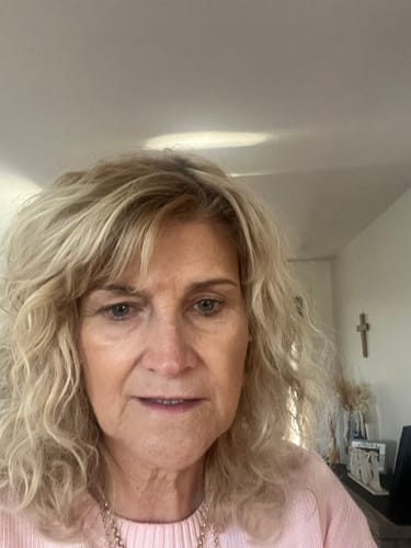 A customer's selfie submitted with their review.