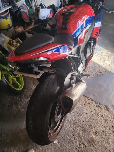 Customer's red Honda CBR1000RR-R from the rear, showing the sleek and minimal tail tidy installed.