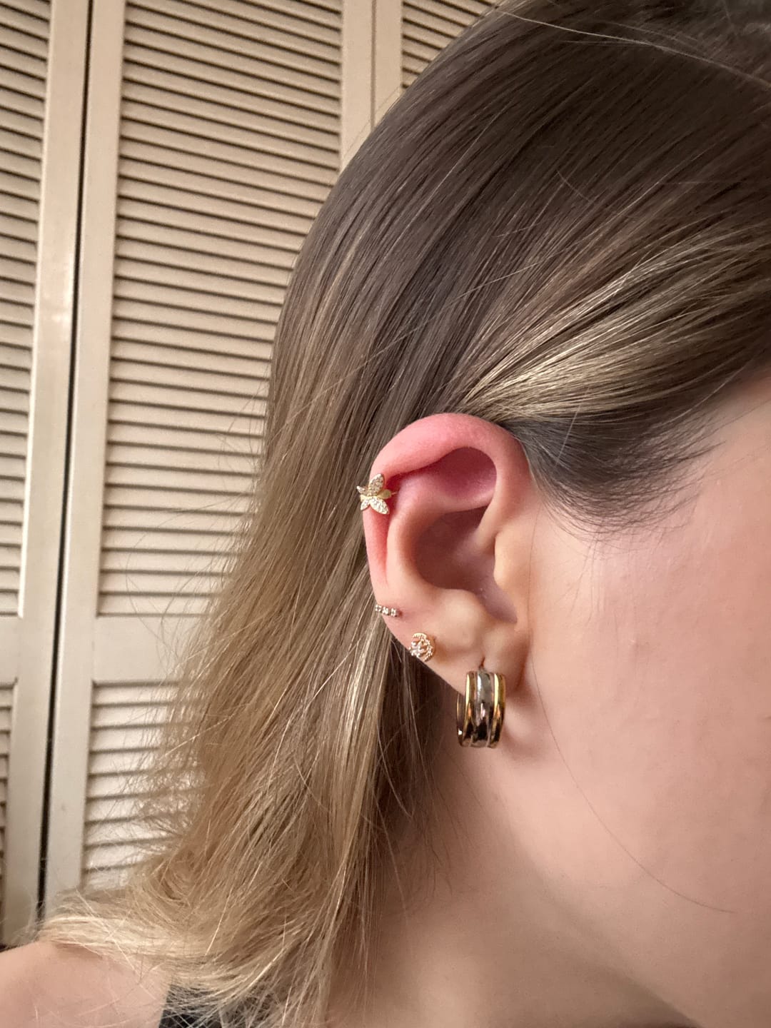 Customer photo review of Acero Inoxidable Dorado Con Zirconias Primera Perforación