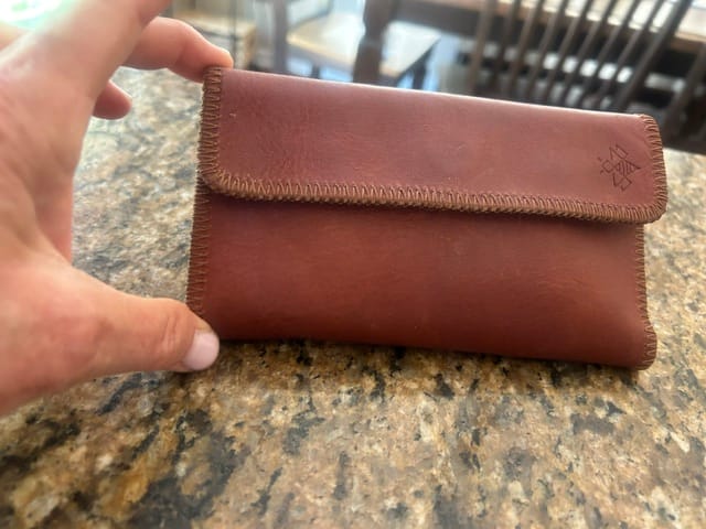 Customer photo review of Cognac Travel Wallet