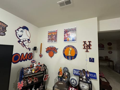 Customer's Knicks Dynasty 3D Metal Wall Art displayed on a wall with other New York sports memorabilia.