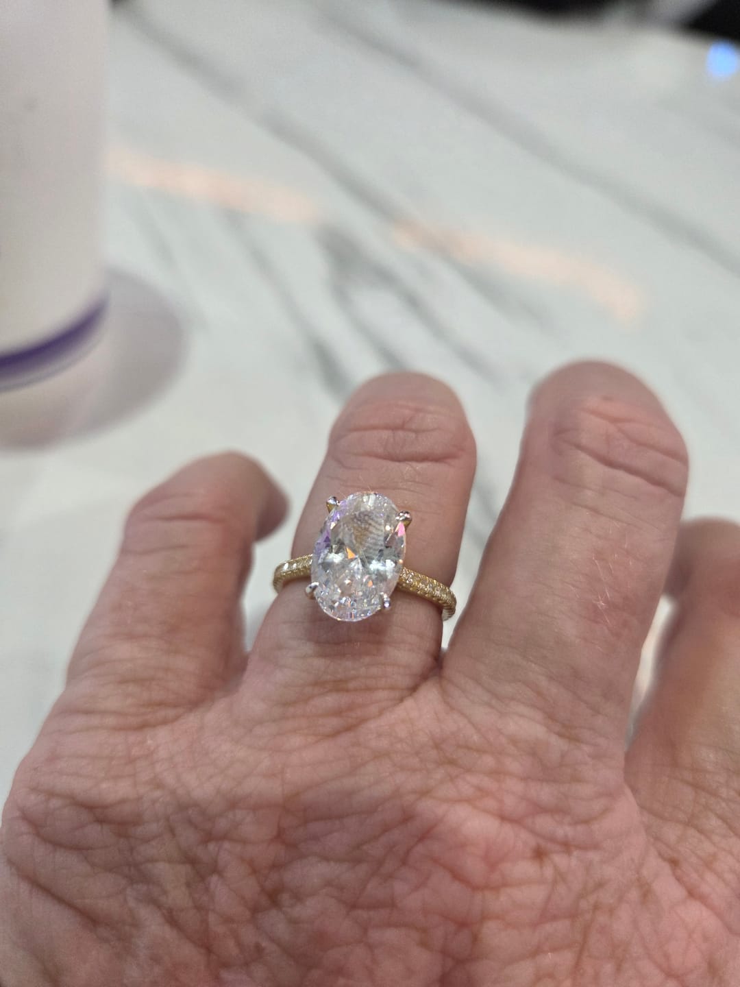 Customer photo review of The Eloise Oval Sapphire Engagement Ring