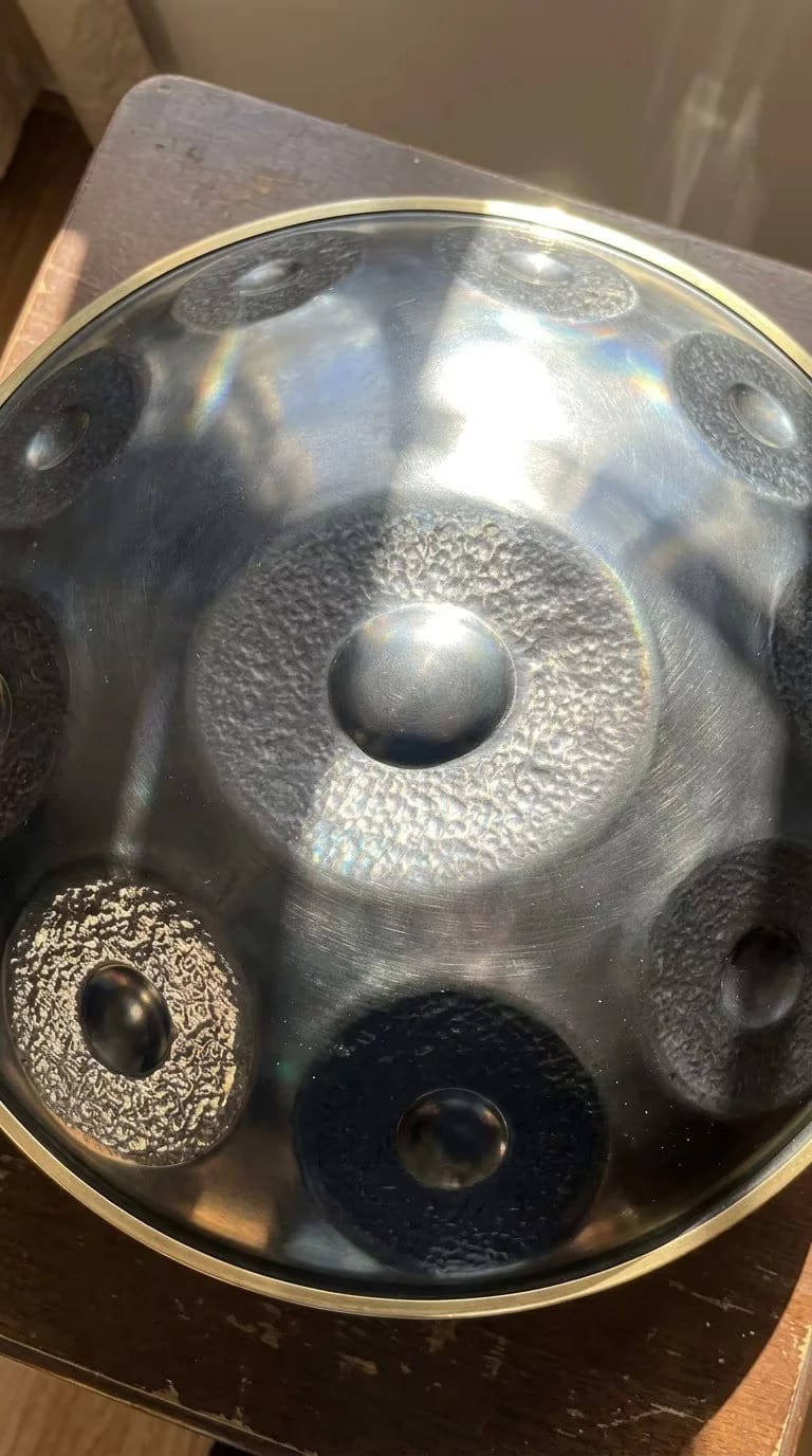 Customer photo review of Cosmos Handpan - Hand-Pounded 9/10/12 Notes in D Minor - Tambourine Gift Set