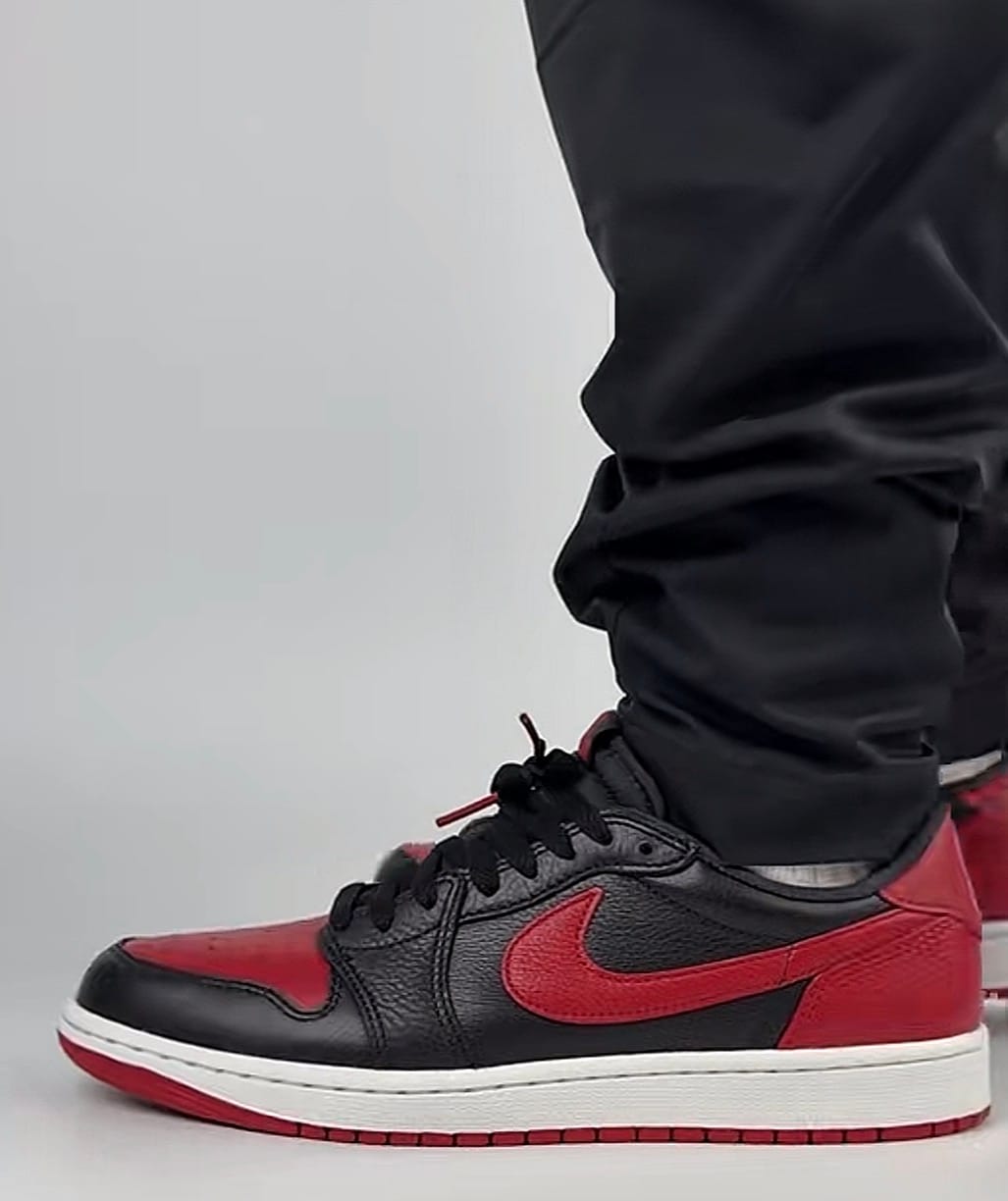 Customer photo review of Air Jordan 1 Retro Low OG "Banned" Black and Varsity Red