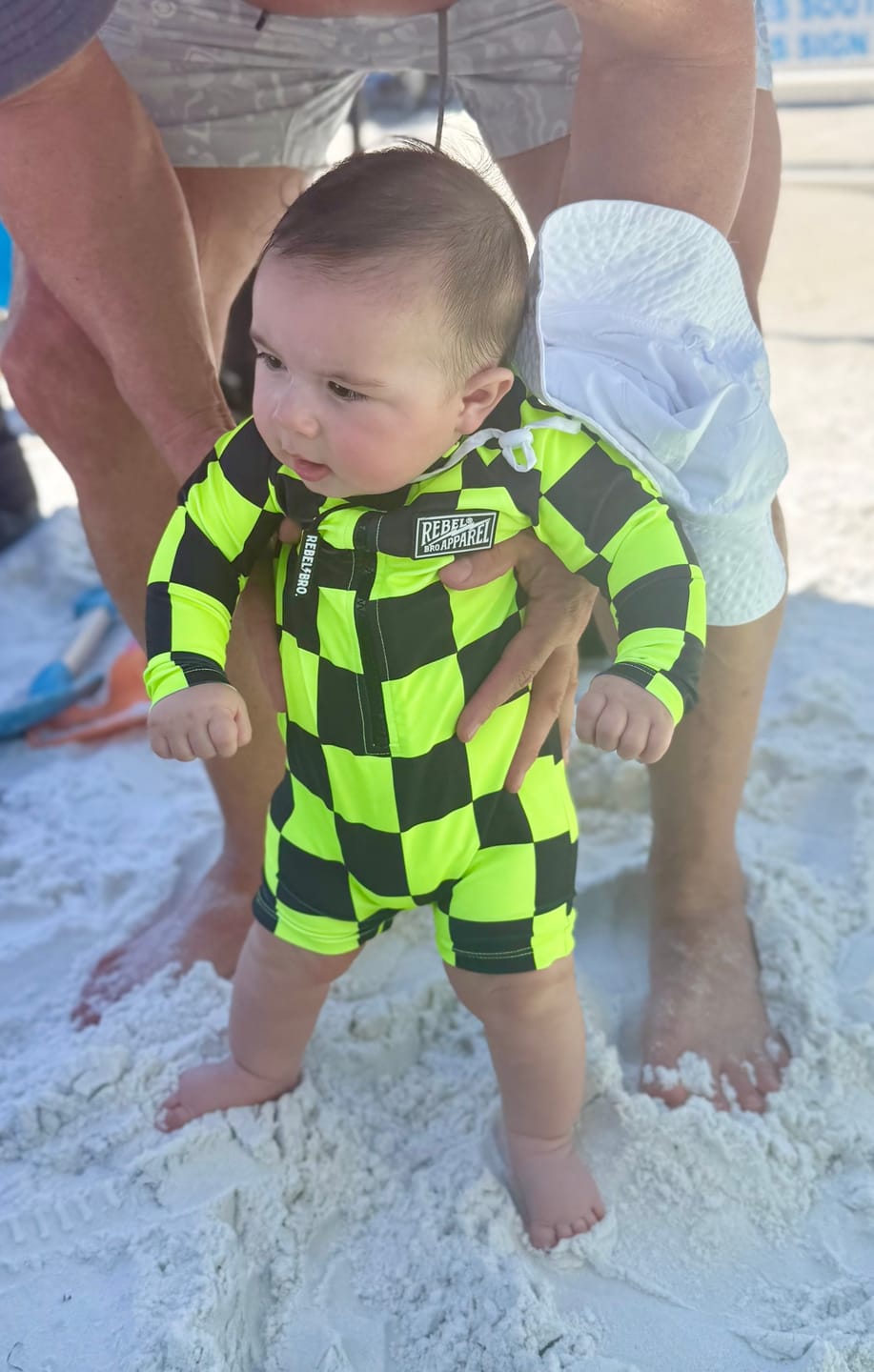 Customer photo review of UPF50+ Boys Swim Romper in Neon Electric Lime + Black Checkered
