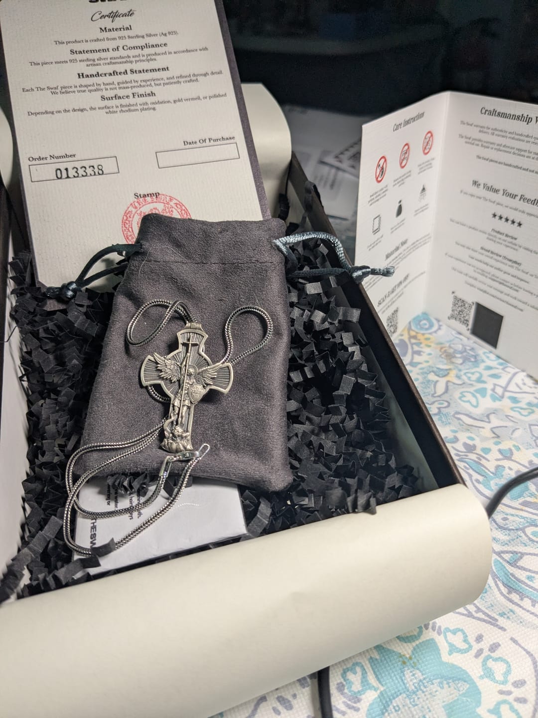 Customer photo review of Saint Michael Cross Necklace