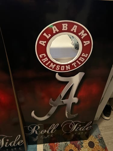 Customer's custom cornhole board wrap with an Alabama Crimson Tide theme in red and black.