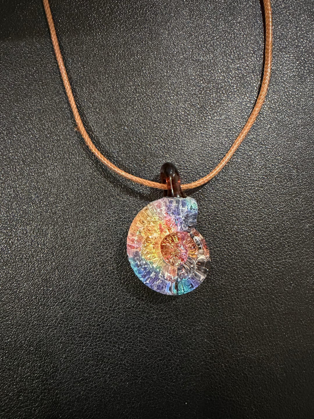 Customer photo review of Dichroic Glass Ammonite with Cremation Ash