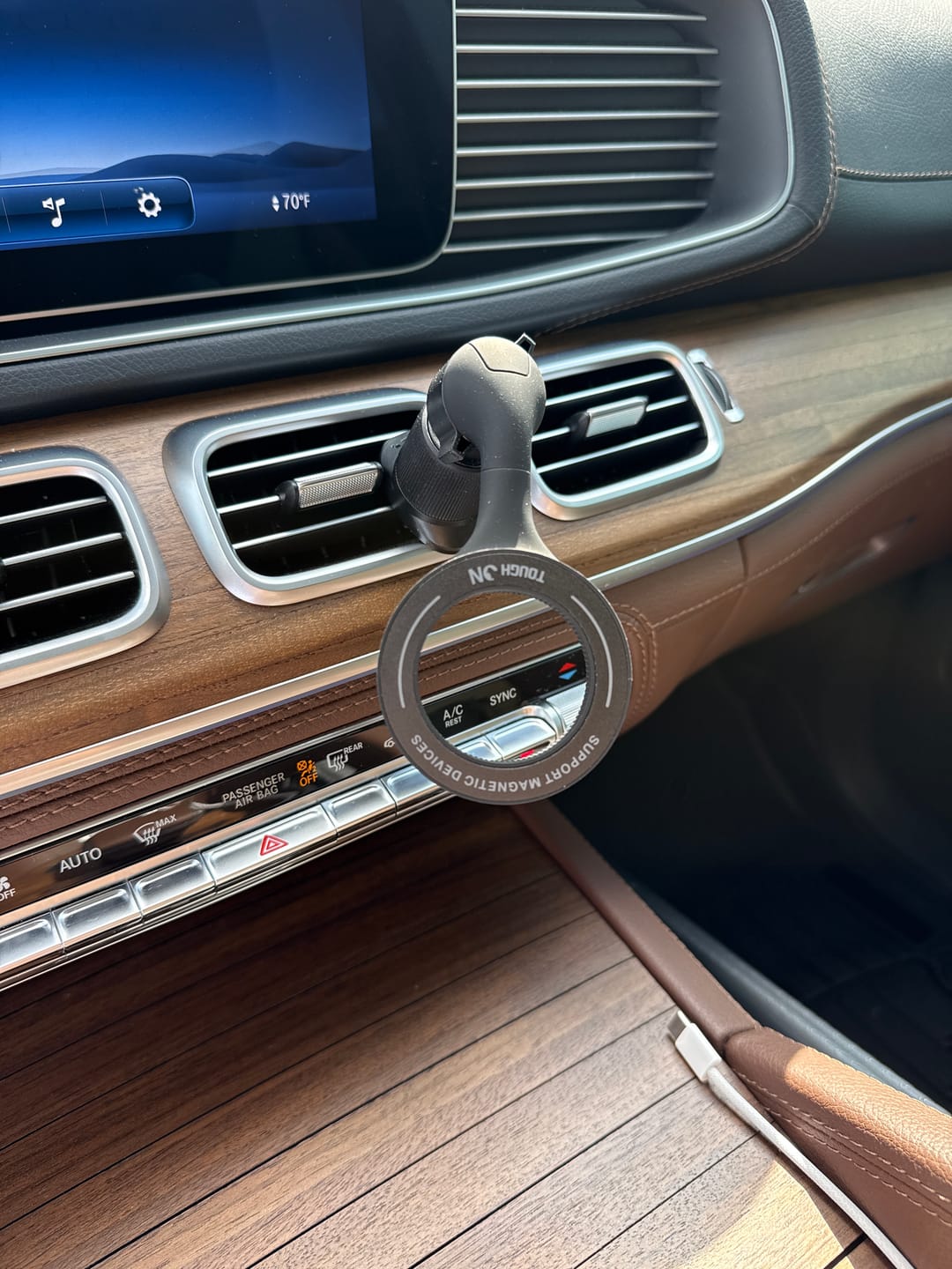 Customer photo review of Tough On MagSafe Car Mount Magnetic Phone Holder for Car Air Vent