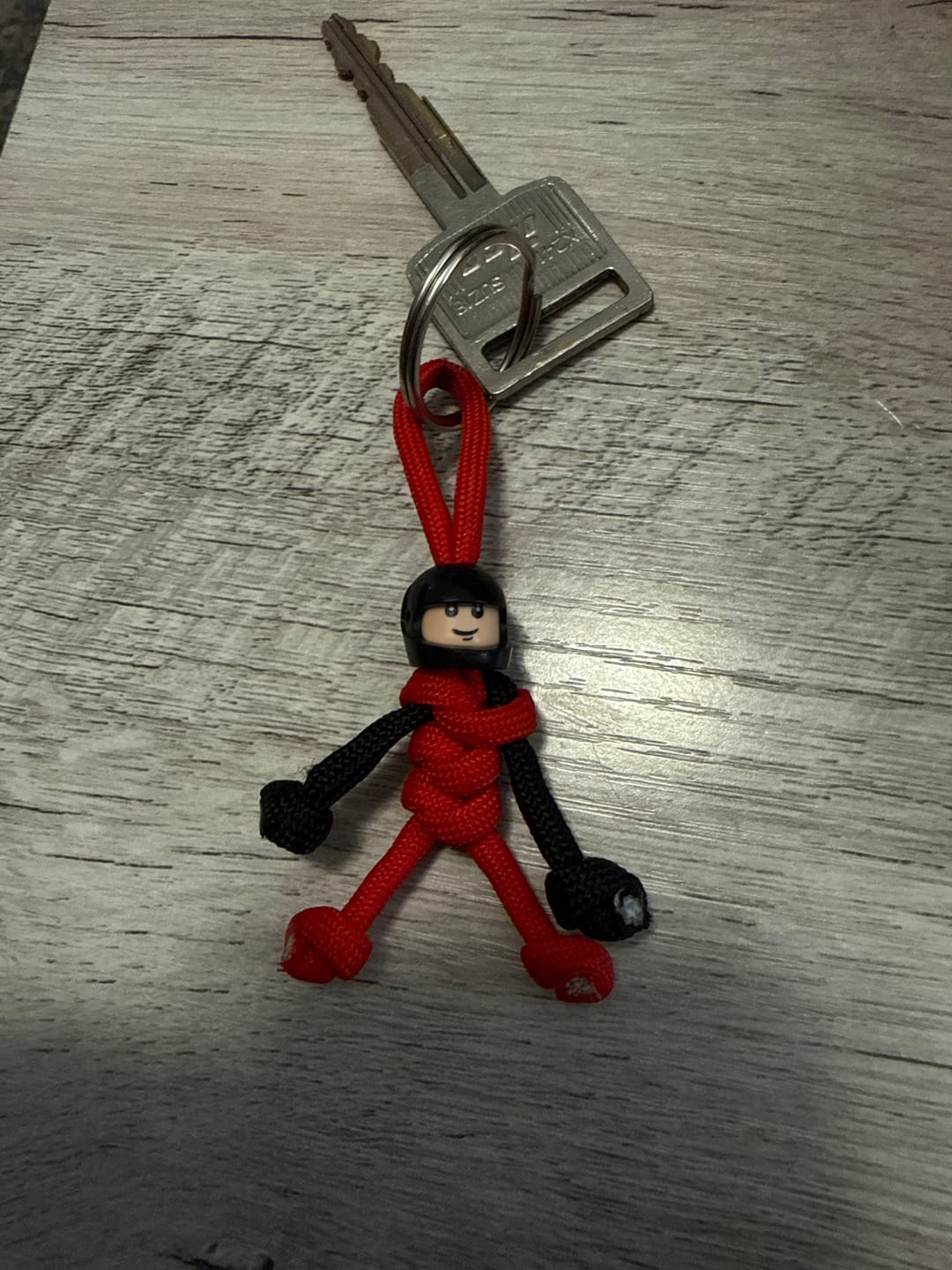 Customer photo review of Black Red Biker Buddy Paracord Keychain