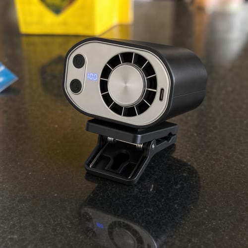 Black and silver cooling fan on a countertop
