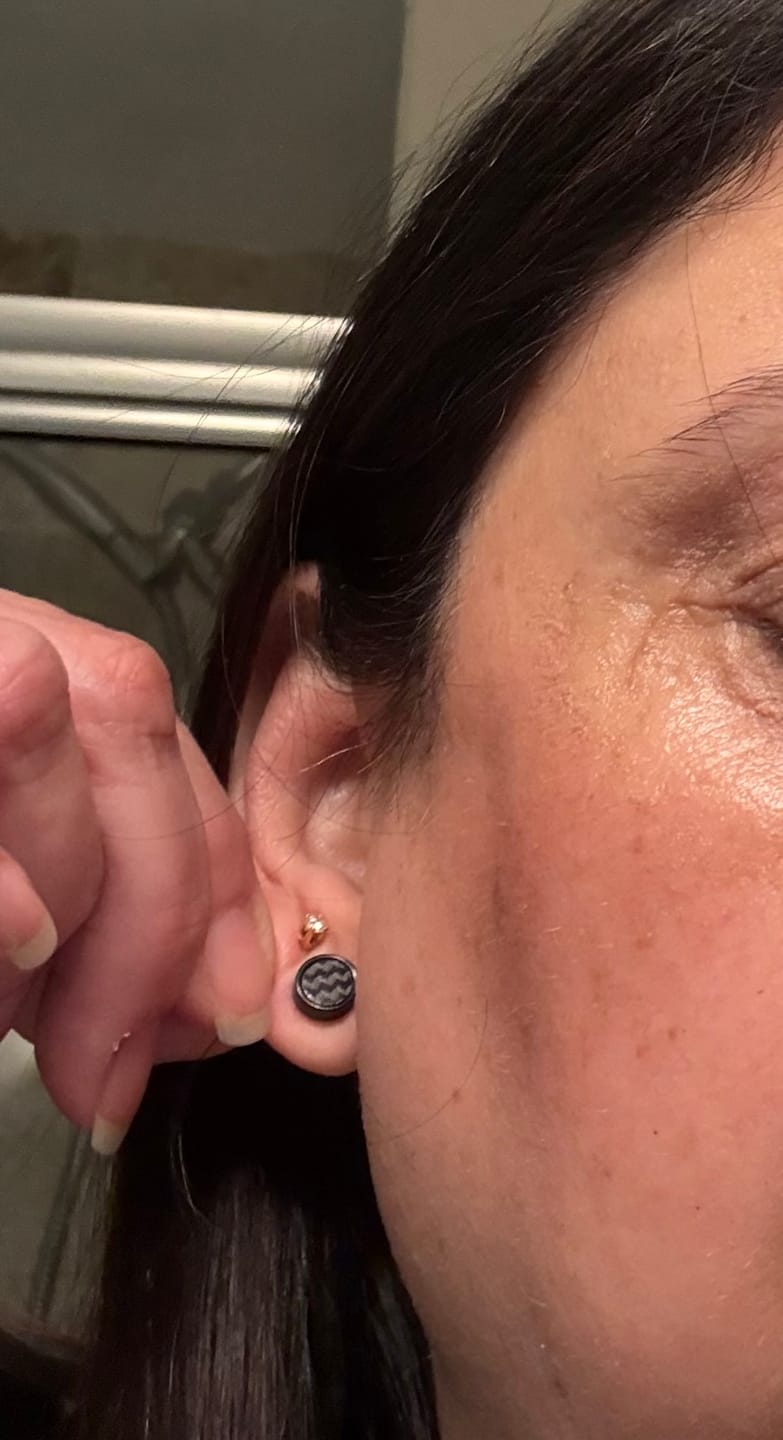 Customer photo review of Cycolinks Stainless Steel Carbon Fiber Stud Earrings