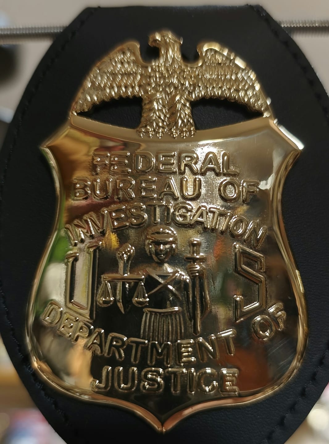 Customer photo review of FBI Department of Justice Badge Solid Copper Replica Movie Props