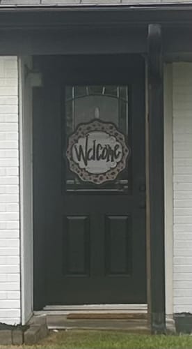 Customer photo review of Leopard Cheetah Welcome Door Hanger