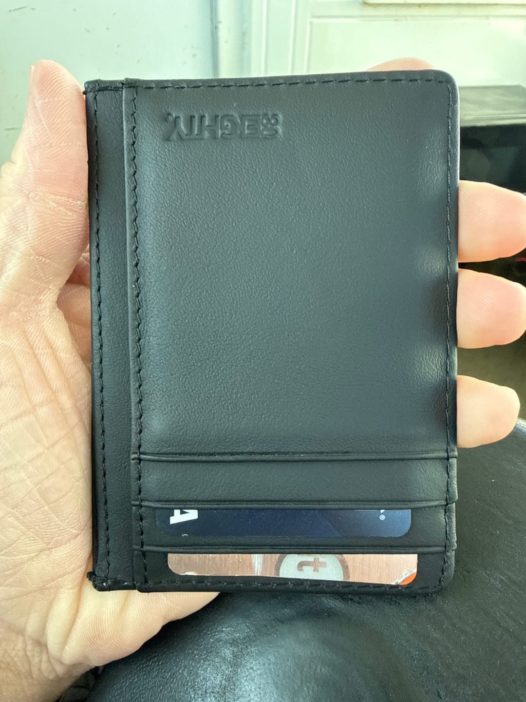 Customer photo review of 80Eighty® Black Leather Wallet