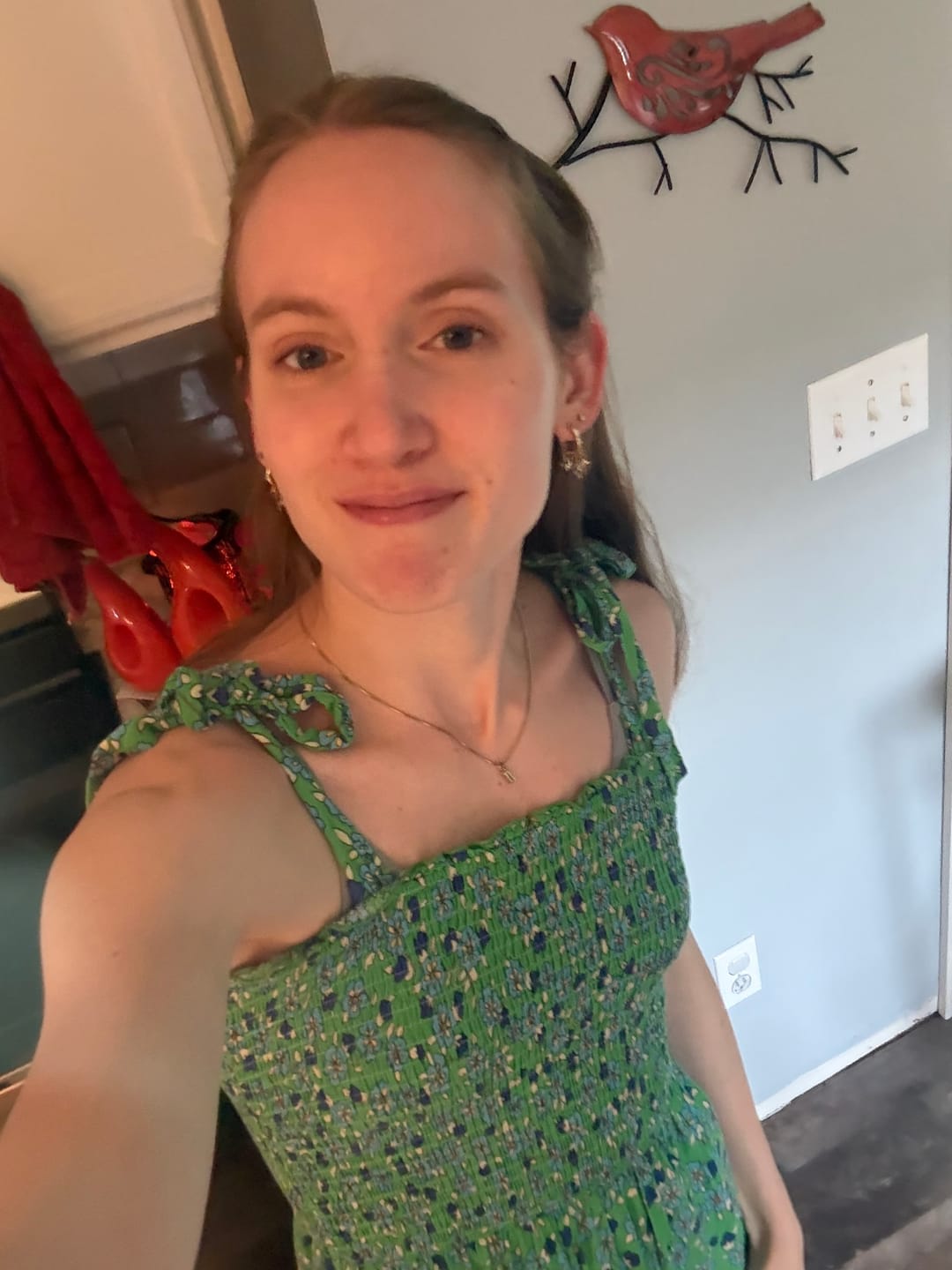 Customer photo review of Cascade Cross Necklace