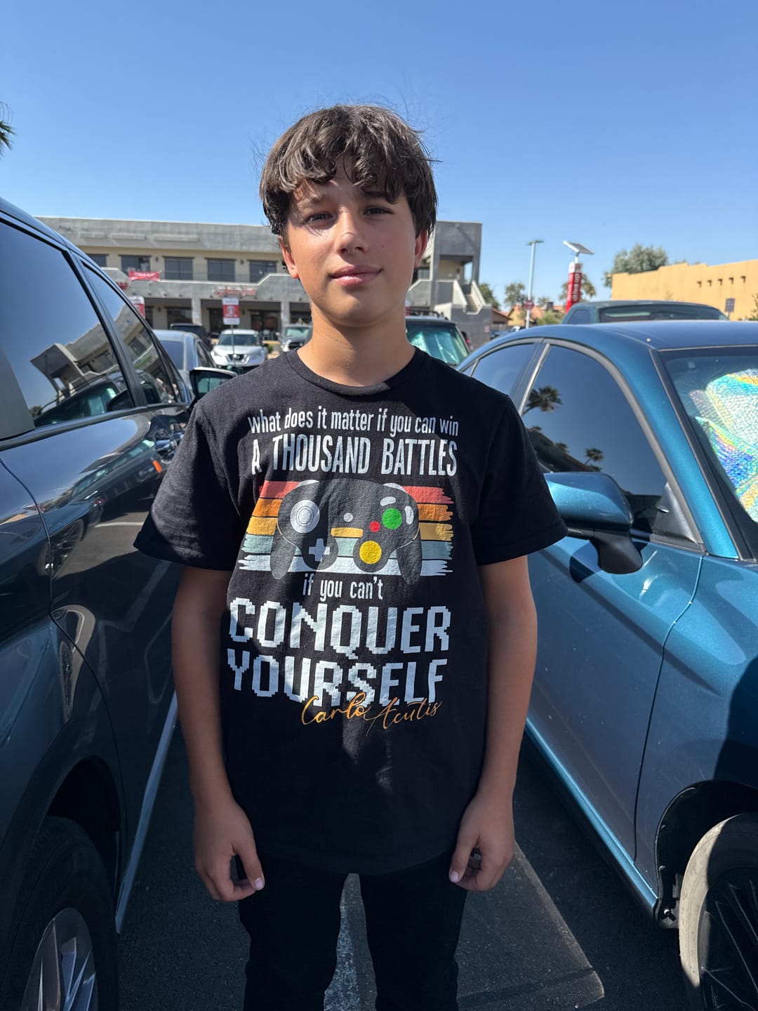 Customer photo review of Acutis Game T-Shirt