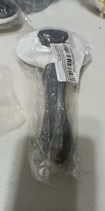 Customer photo review of Self Cleaning Pet Grooming Brush for Dogs and Cats