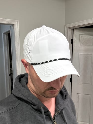 Customer wearing the white Big Flat Bill Rope Sport Hat, showing the fit and the black and white rope detail.