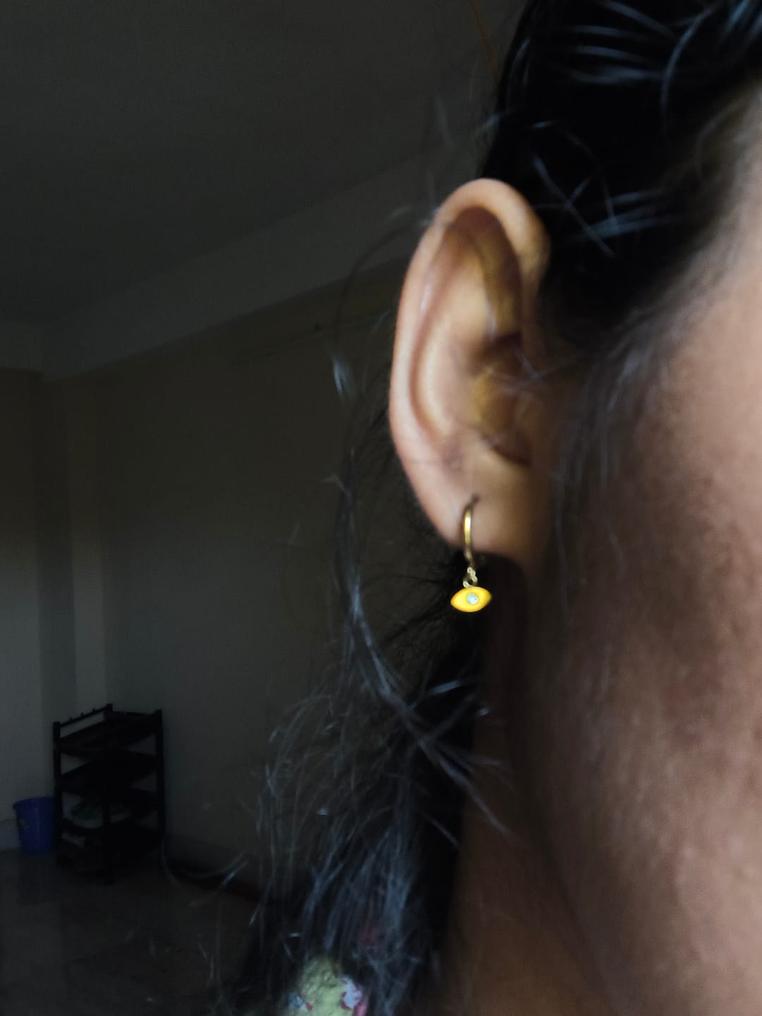 Customer photo review of Tiny Iris Star Drop Hoop Earrings