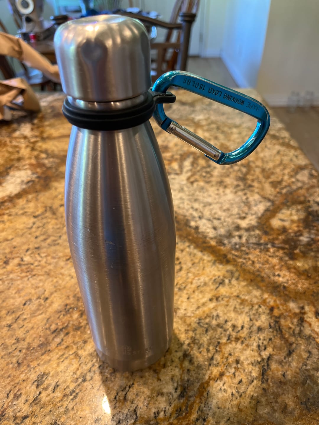 Customer photo review of Stainless Steel Double Wall Vacuum Insulated Water Bottle with Carrier Holder for Adults & Kids - 12 oz, 17 oz and 25 oz