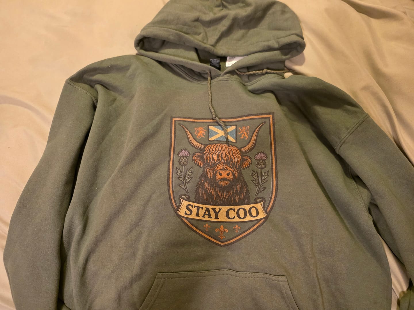 Customer photo review of Bargain Bin Overstock! Highland Cow "Scottish Heraldry" Hoodie