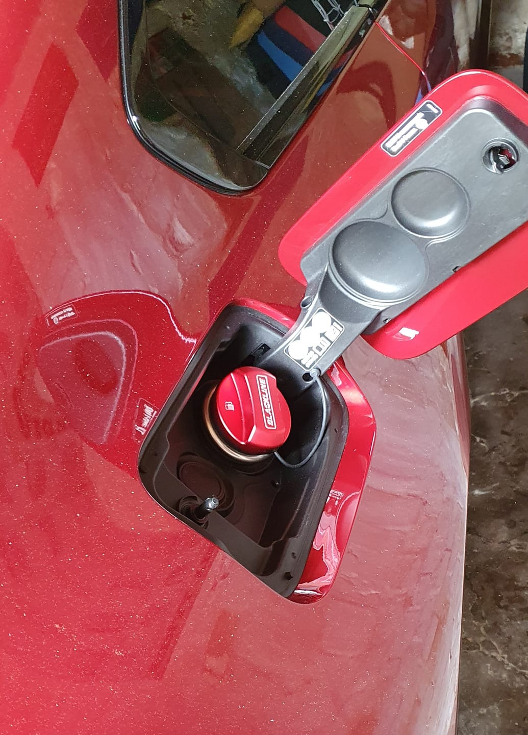 Customer photo review of GoldenWrench BMW BLACKLINE "Premium Fuel Only" Performance Fuel Cap Cover for BMW (2010+)