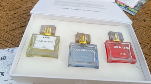 Customer's OUD Supreme BUNDLE with three fragrance bottles, Oud Serene, Oud Nirvana, and Ora 1776, in a white box.