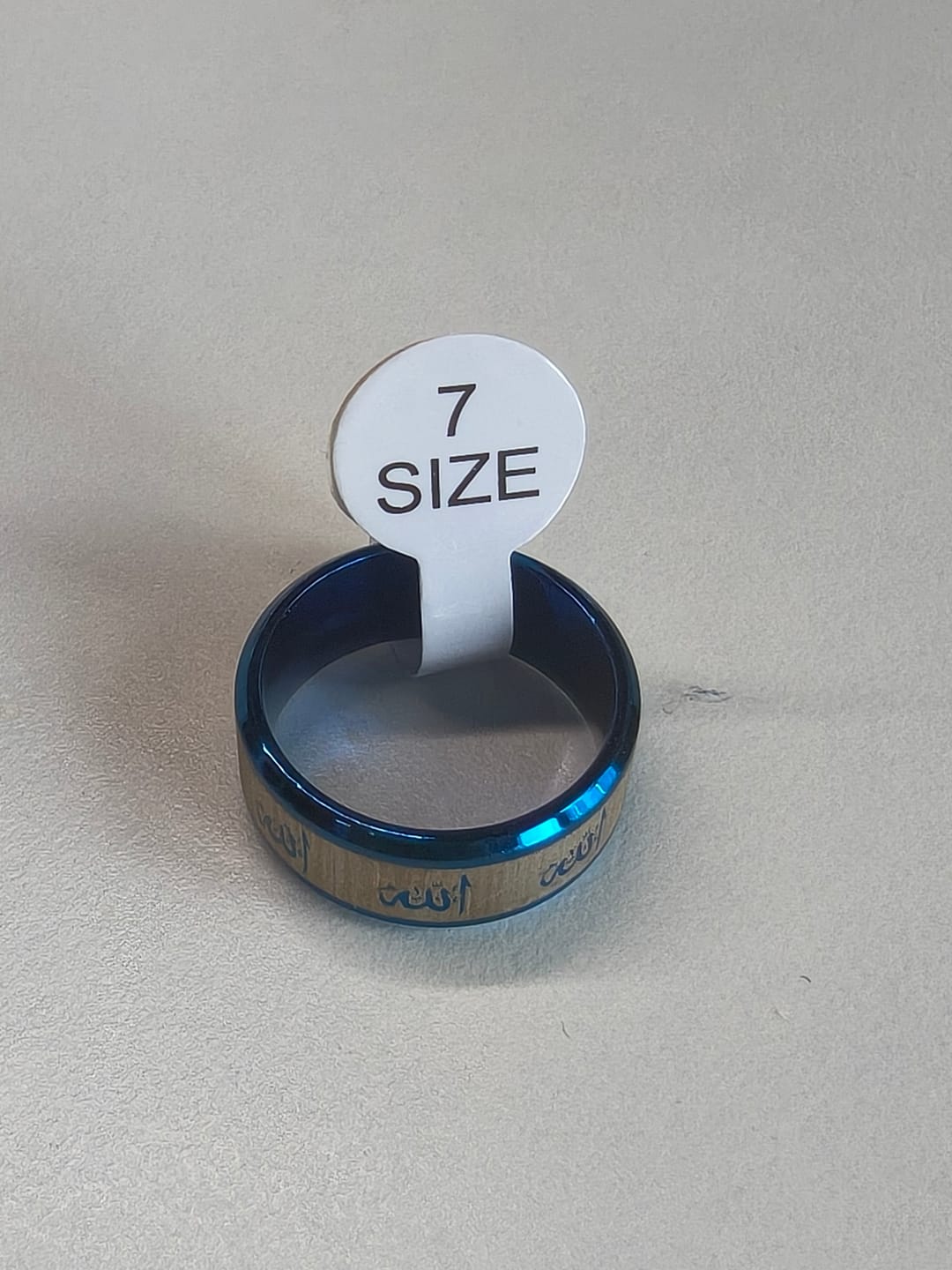 Customer photo review of HilalHaven Name of Light Allah Engraved Brushed Band Ring — Polished Stainless Stee