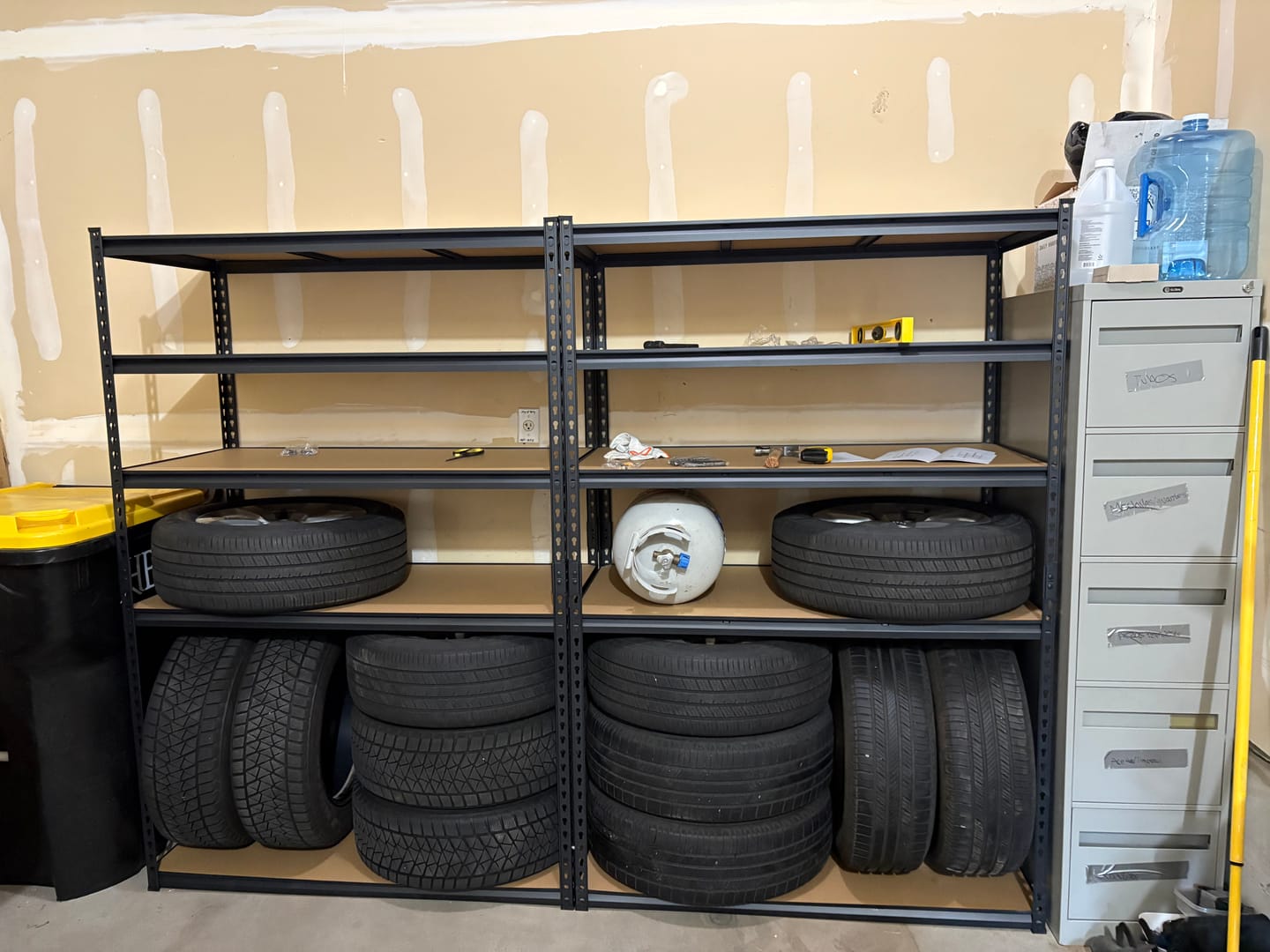 Customer photo review of Reibii 48.2" W x 24" D Heavy Duty Garage Shelving Units Load 3000LBS, Adjustable Steel Shelves for Garage Basement Warehouse