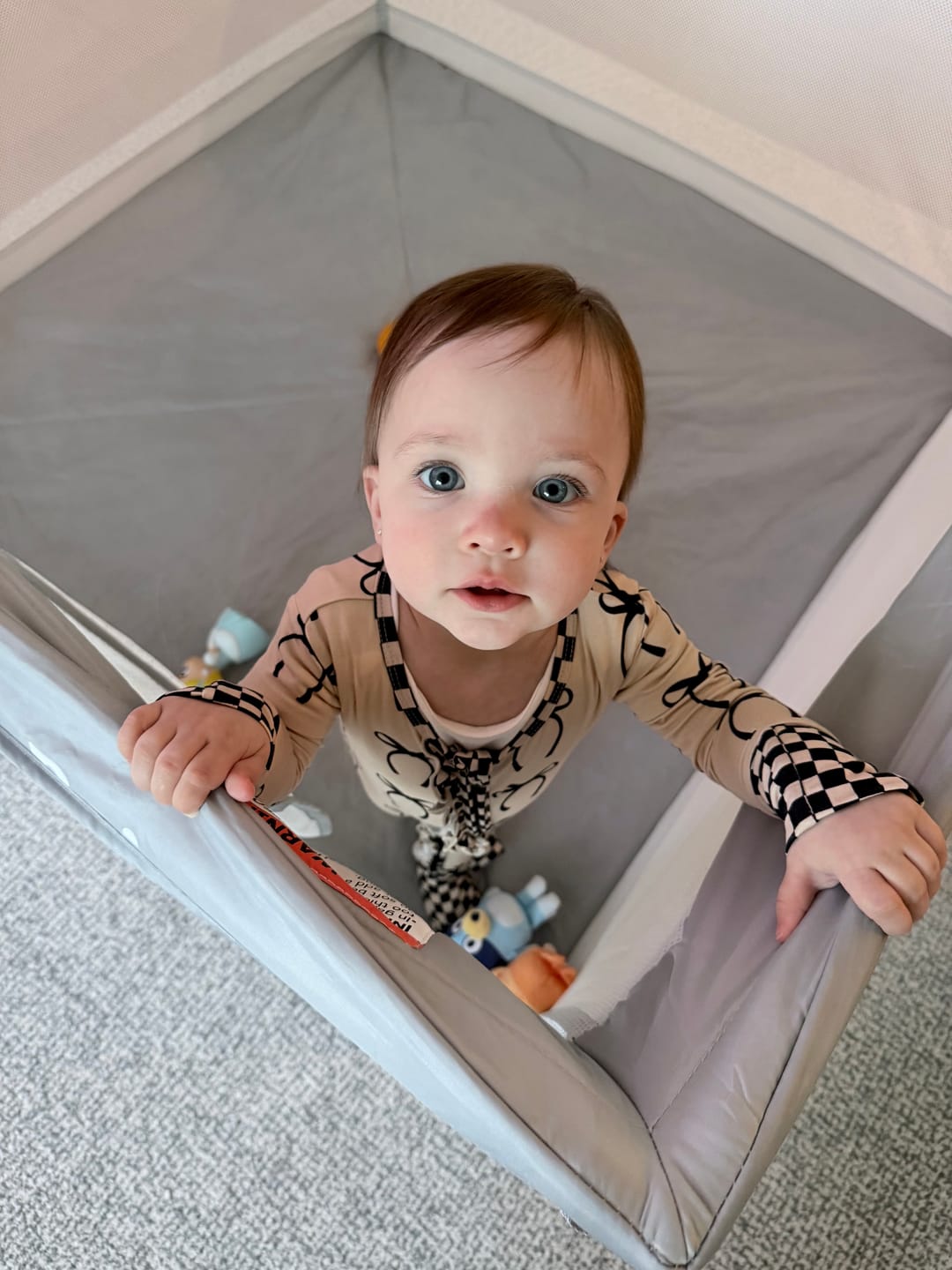 Customer photo review of Ruffled Bamboo Zippy Sleeper in Lana (Bows)