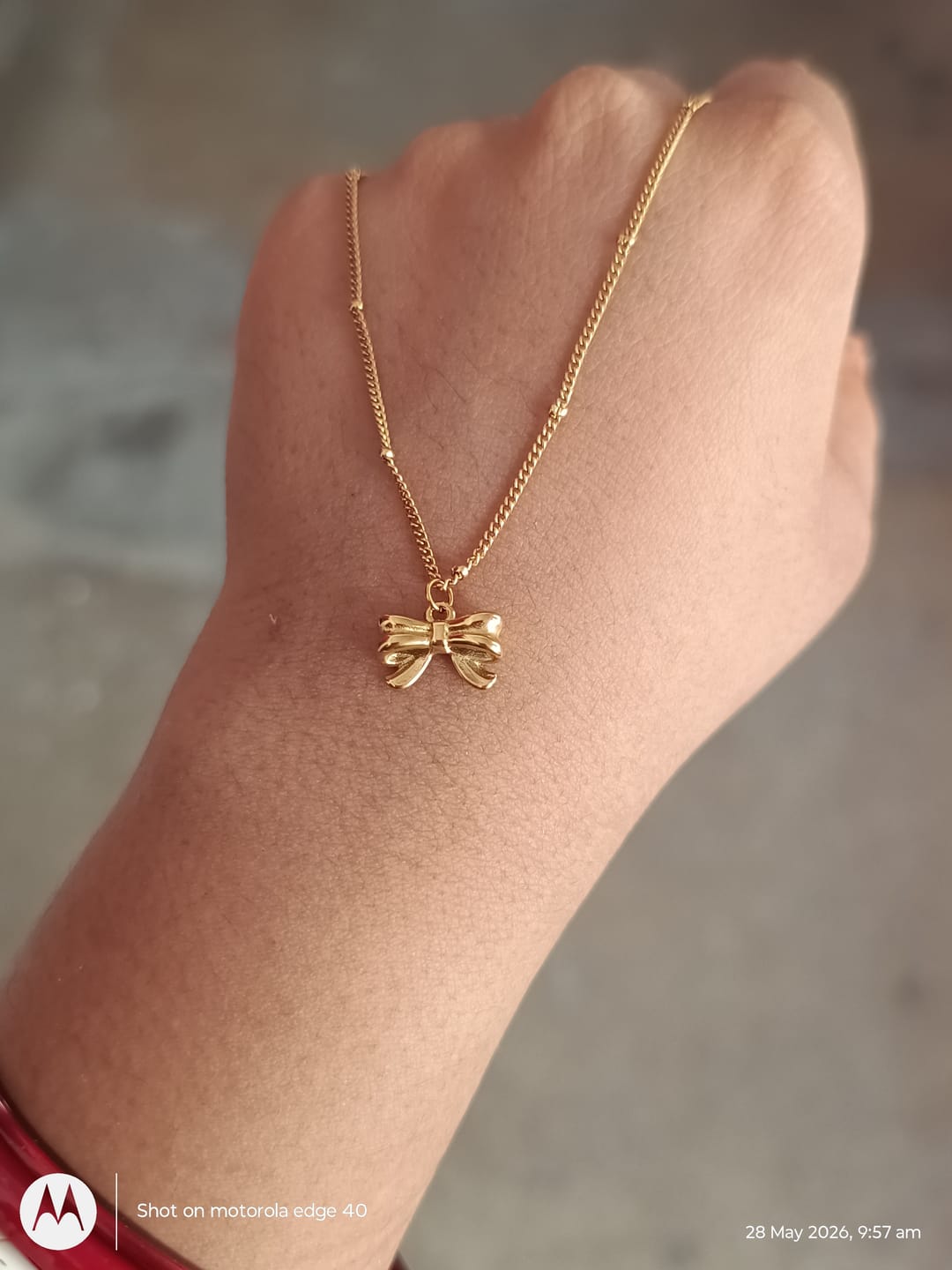 Customer photo review of Bow Pendant Necklace