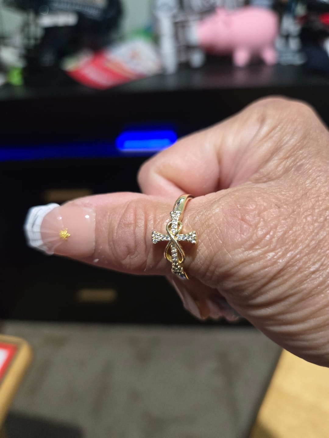 Customer photo review of Christianartworkshop Golden/Silver Mobius Cross Ring: Carry His Grace in Daily Wear
