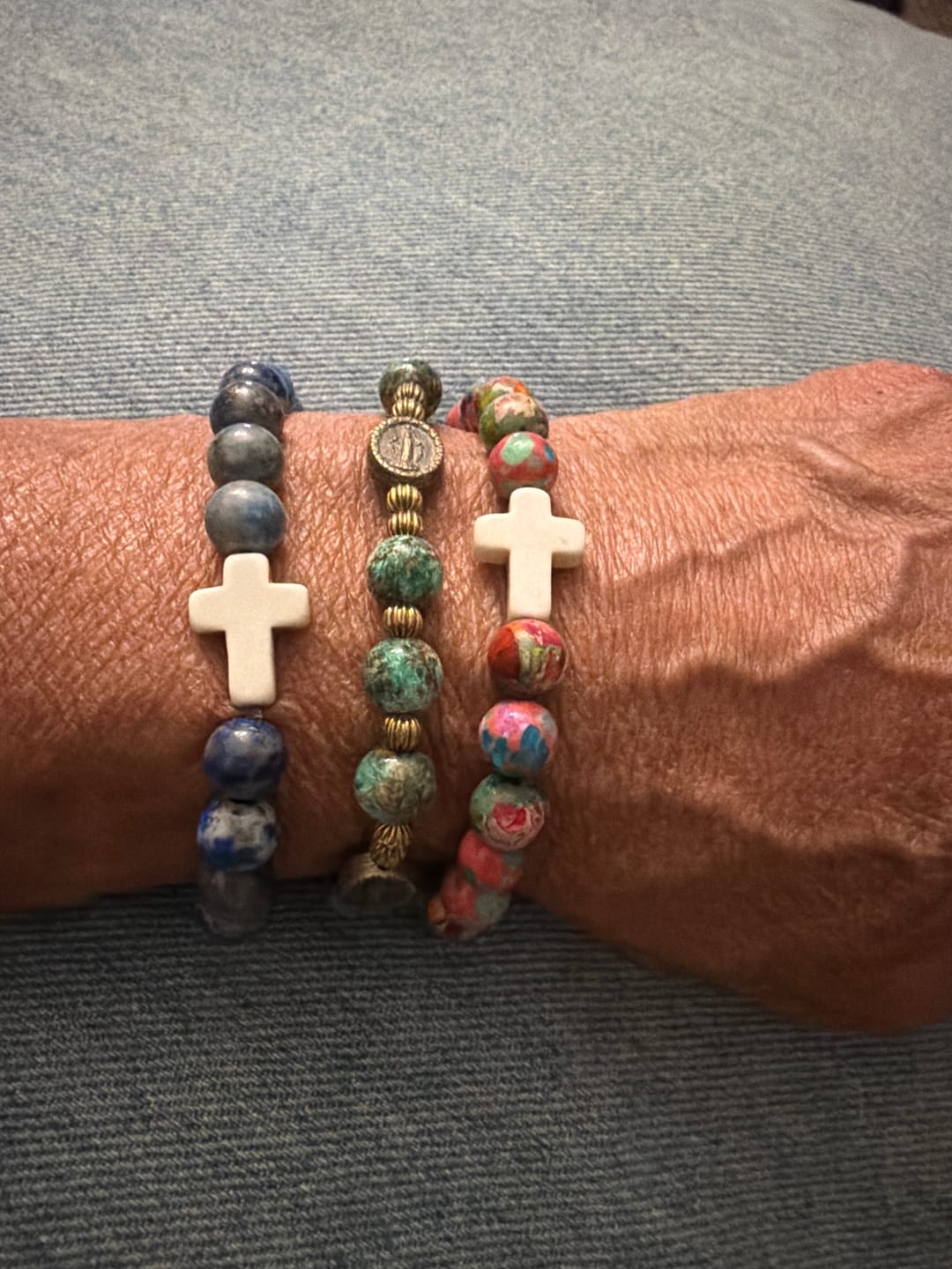 Customer photo review of Natural Stone Cross Bracelet with Proverbs 27:9 Card: A Symbol of Divine Friendship & Grace