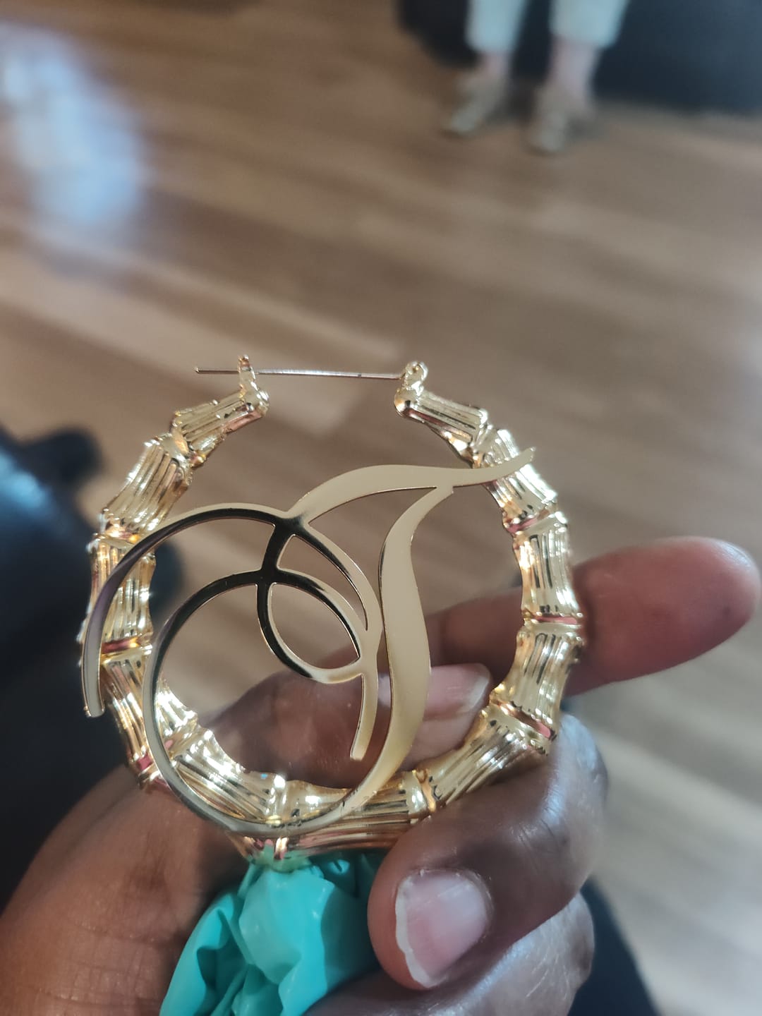 Customer photo review of Bamboo Initial Hoop Earrings