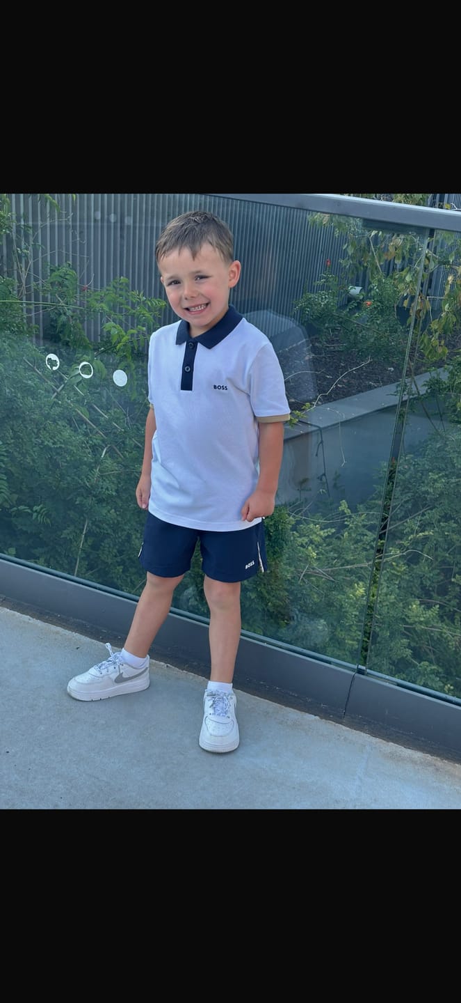 Customer photo review of Boys White Polo with Contrast
