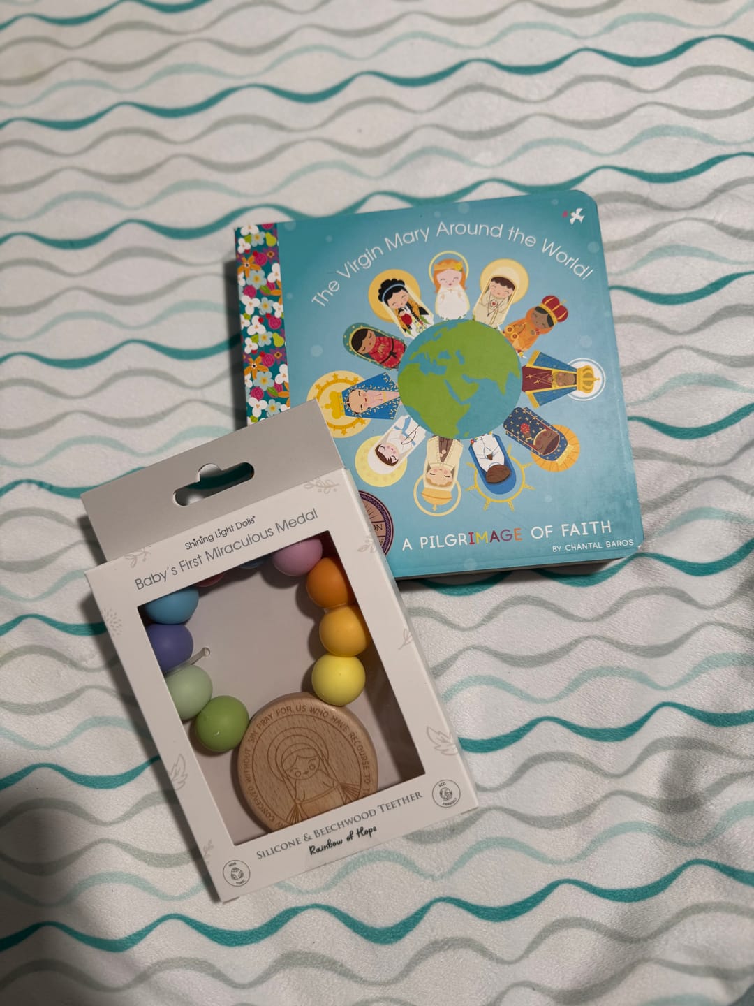 Customer photo review of Baby's First Miraculous Medal Teether - Rainbow of Hope