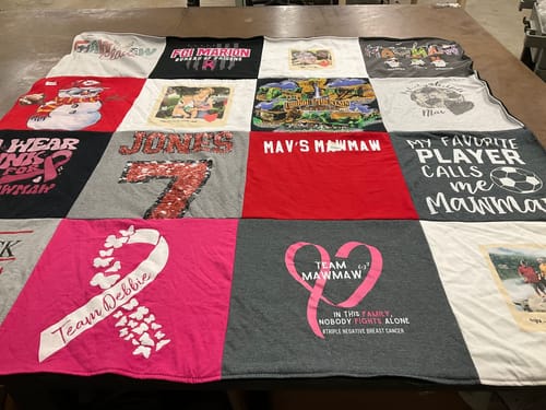 Customer's memorial Project Repat T-Shirt Quilt, created from their mother's personal t-shirts and laid out flat.