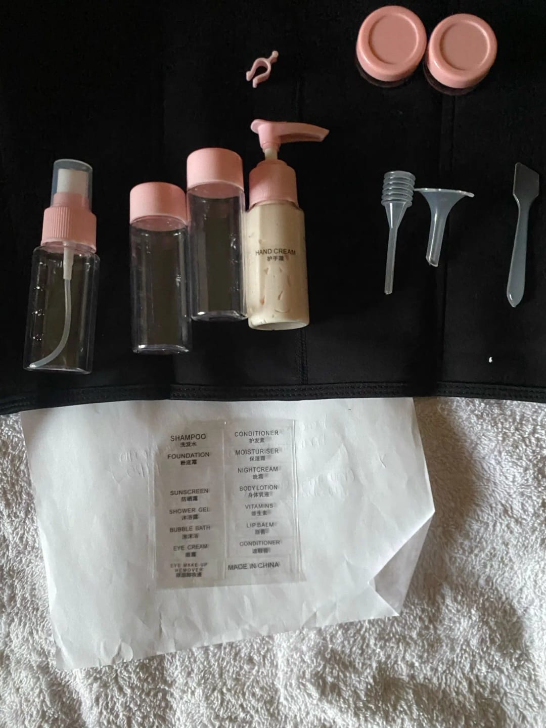 Customer photo review of Trousse de Toilette Transparente Kit Avion Complet (7 Flacons)