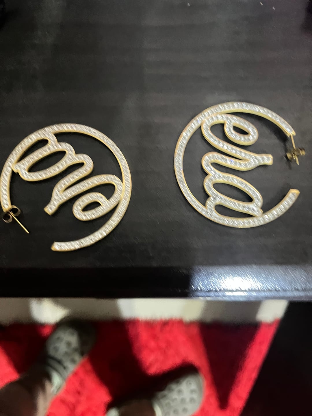 Customer photo review of Gold Luxe Logo Hoops