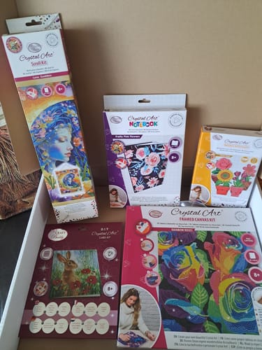 Customer's unboxed Floral Crystal Art Mystery Box, showing five assorted, colorful craft kits inside.