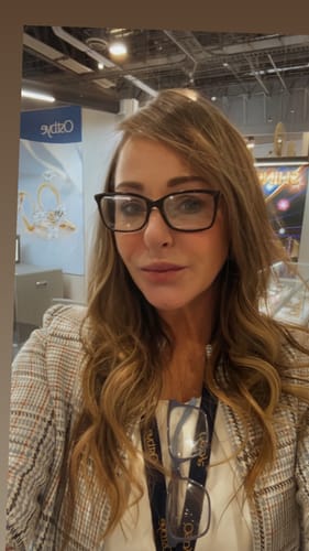 Reviewer's selfie showing smooth facial skin after using The Micro Infusion System.