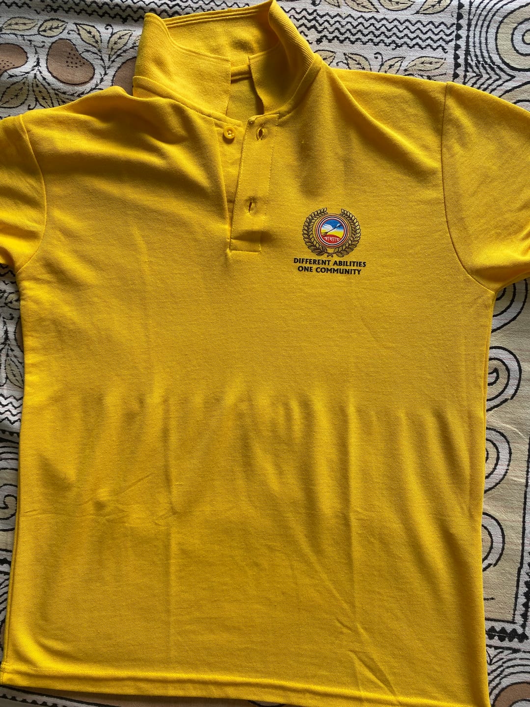 Customer photo review of Customized Polo T-Shirt With Your Company Logo | Order Logo Printed Tees | PrintMine.in
