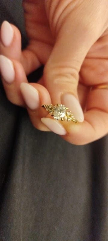 Customer photo review of 3 Carat Oval Cut Moissanite Ring with Cluster Side Stones