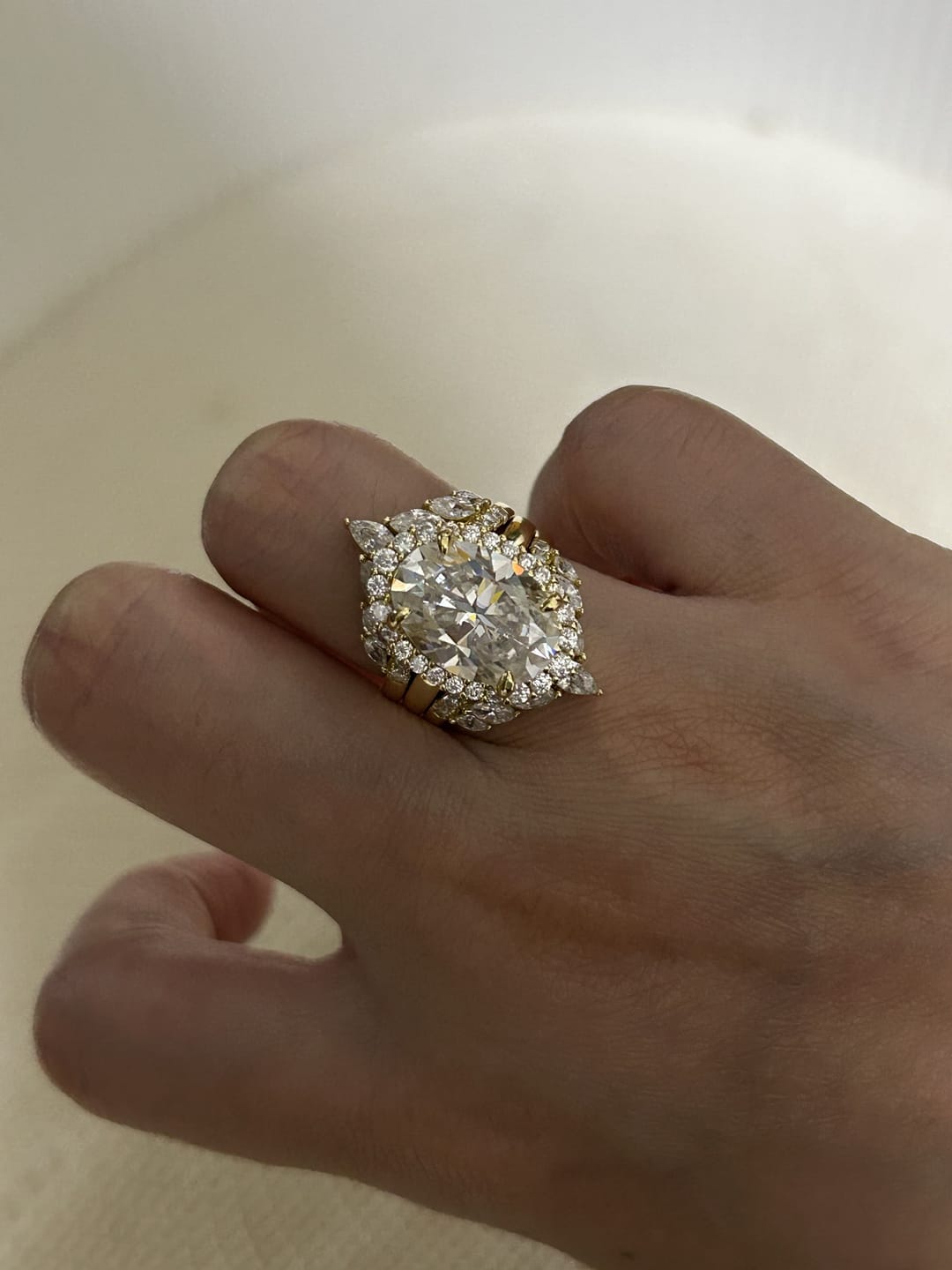 Customer photo review of Sparkling 8.0ct Oval Cut Halo 3PC Wedding Ring Set in Sterling Silver
