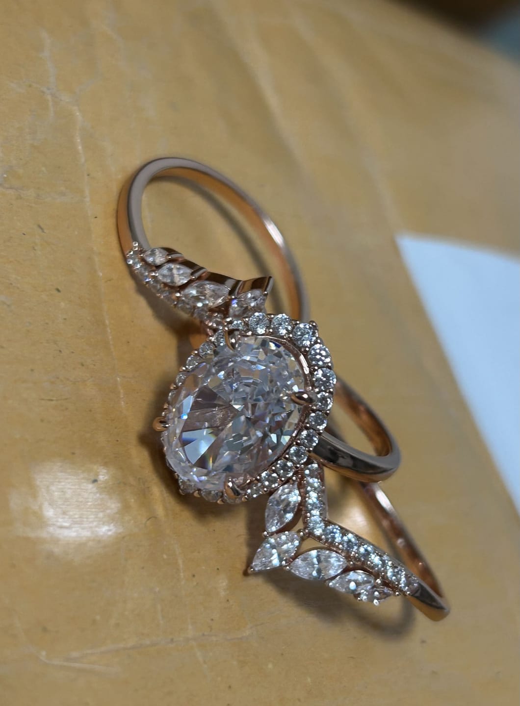 Customer photo review of Sparkling 8.0ct Oval Cut Halo 3PC Wedding Ring Set in Sterling Silver